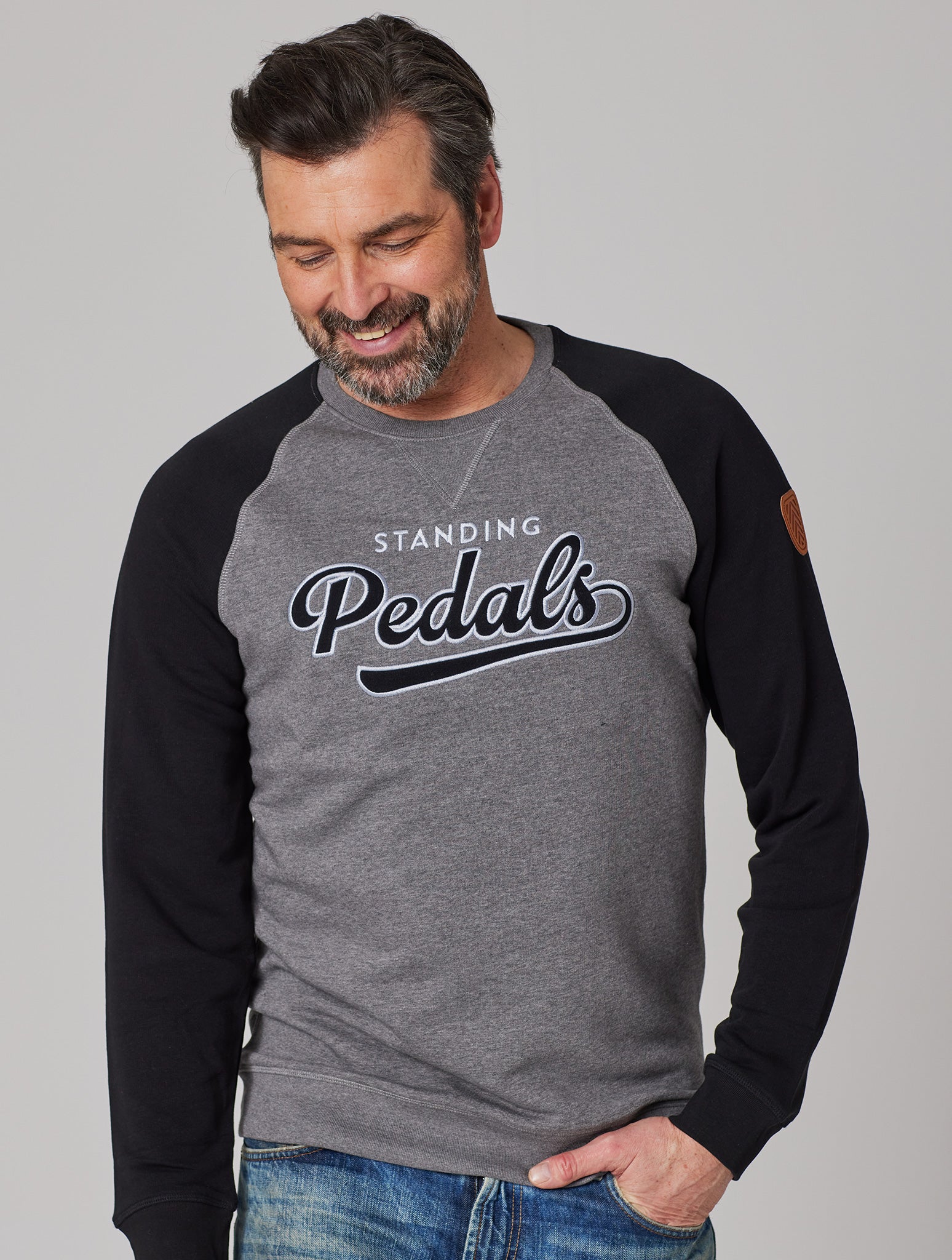 Premium Herren Raglan Sweater UNIVERSITY OF STANDING PEDALS